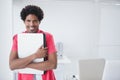 Happy businessman holding his laptop Royalty Free Stock Photo