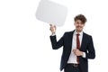 Happy businessman holding speech bubble and laughing Royalty Free Stock Photo
