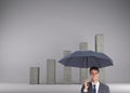 Happy businessman holding umbrella Royalty Free Stock Photo