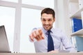 Happy businessman pointing on you in office Royalty Free Stock Photo