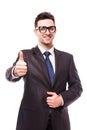 Happy businessman showing his thumb up with smile on white background Royalty Free Stock Photo