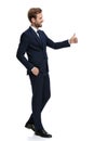 Happy businessman smiling and making thumbs up sign Royalty Free Stock Photo