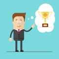 Happy businessman specifies hand on the award . Thoughts the Cup. Royalty Free Stock Photo