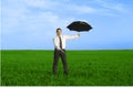 Happy businessman standing with umbrella Royalty Free Stock Photo