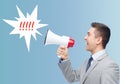 Happy businessman in suit speaking to megaphone Royalty Free Stock Photo