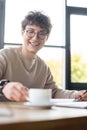 Happy businessman taking coffee cup near Royalty Free Stock Photo