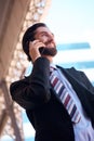 Happy businessman talking on cell phone Royalty Free Stock Photo