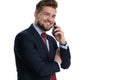 Happy businessman talking on his phone and laughing Royalty Free Stock Photo