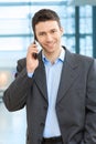 Happy businessman talking on mobile Royalty Free Stock Photo