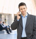 Happy businessman talking on mobile Royalty Free Stock Photo