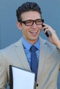 Happy businessman talking on the phone with folder in hand isolated over blue background in studio shooting Royalty Free Stock Photo