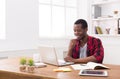 Happy businessman win. Winner, black man in office Royalty Free Stock Photo