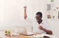 Happy businessman win. Winner, black man in office Royalty Free Stock Photo