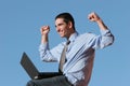 Happy businessman working on laptop Royalty Free Stock Photo