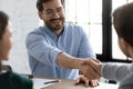 Smiling businessmen handshake closing deal at office meeting Royalty Free Stock Photo