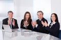 Happy Businesspeople Clapping Royalty Free Stock Photo