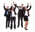 Happy businesspeople jumping in joy