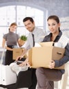 Happy businesspeople moving to new office Royalty Free Stock Photo