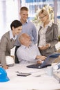 Happy businessteam busy at work Royalty Free Stock Photo