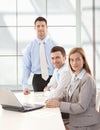 Happy businessteam working together smiling Royalty Free Stock Photo