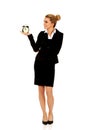 Happy businesswoman with alarm clock Royalty Free Stock Photo