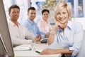 Happy businesswoman in boardroom Royalty Free Stock Photo