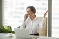 Happy businesswoman excited about hearing good news talking on p Royalty Free Stock Photo