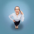 Happy businesswoman in eyeglasses with smartphone Royalty Free Stock Photo