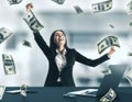 Happy businesswoman and falling dollar bills Royalty Free Stock Photo