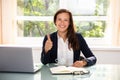 Happy Businesswoman Gesturing Thumbs Up Royalty Free Stock Photo