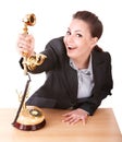 Happy businesswoman with golden phone.