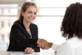 Happy businesswoman hr manager handshake hire candidate selling insurance services Royalty Free Stock Photo