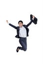 Happy businesswoman jumping with a briefcase Royalty Free Stock Photo