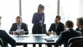 Happy businesswoman manager laughing in boardroom at meeting. Royalty Free Stock Photo