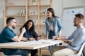 Happy businesswoman manager laughing at joke in boardroom at meeting. Royalty Free Stock Photo