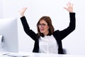 Happy businesswoman with raised hands up Royalty Free Stock Photo