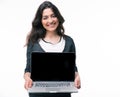 Happy businesswoman showing blank laptop screen Royalty Free Stock Photo