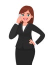 Happy businesswoman speaking on the phone holding hand on hip. Telecommunication, technology and mobile or smartphone concept. Royalty Free Stock Photo