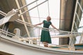 Happy Businesswoman standing in the corridor at office Royalty Free Stock Photo