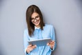 Happy businesswoman standing with table computer Royalty Free Stock Photo