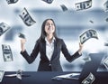 Happy businesswoman in suit and falling dollar bills Royalty Free Stock Photo