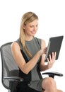 Happy Businesswoman Using Digital Tablet While Sitting On Chair Royalty Free Stock Photo