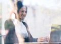 Happy businesswoman using laptop in cafe Royalty Free Stock Photo