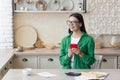 Happy Businesswoman Using Mobile Phone at Home Office. Cheerful smiling business woman Royalty Free Stock Photo