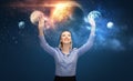 Happy businesswoman with virtual planets and space