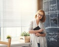 Happy businesswoman woman at school board with schedule planning Royalty Free Stock Photo