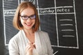 Happy businesswoman woman at school board with schedule planning Royalty Free Stock Photo