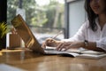 Happy businesswoman working with laptop computer at office desk. Royalty Free Stock Photo