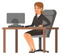 Happy businesswoman at workplace. Woman in suit siiting at desk