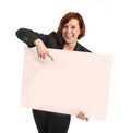 Happy busy business woman holding cardboard sign as copy space Royalty Free Stock Photo